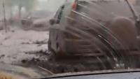 Driver films from inside vehicle as car swept away in Chile floods