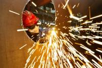 Manufacturing production takes hit in August
