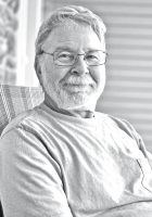 Thomas “Tom” E. Miller