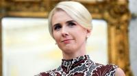 Natalie Harp wears skintight dress that costs $345 after traveling with Donald Trump