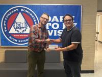 Filipino association donates $1000 to high school music program