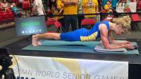 Alberta woman, 61, breaks her own world record by planking for 5 hours