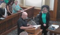 Iowa city council meeting erupts after former member opens with satanic prayer and 'Hail Satan'