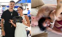 Romeo Beckham and Kim Turnbull attend the Singapore Grand Prix after sharing sexy snap in bed together