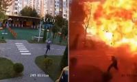 Seconds from death: Moment Ukrainian sprints from path of incoming Russian drone before it lands yards away in huge fireball explosion