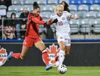 Smith scores late equalizer as Canada salvages 1-1 draw with Denmark