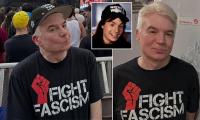 Mike Myers, 63, looks younger than ever as he wears an edgy 'Fight Fascism' T-shirt at politically-charged rock concert
