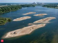 In 2022, contractors began using 400,000 cubic yards of Mississippi River sand to build six islands at Minnesota’s Pigs Eye Lake; the project covers more than 40 acres and aims to protect surrounding wetlands