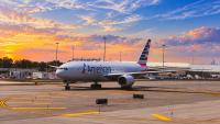 American Airlines Passenger 'Traumatized' After Being Squashed Against Dress Code-Violating Man