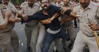 India detains thousands of protesters, locks down Delhi