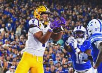 Kentucky beats No. 10 LSU on overtime two-point conversion