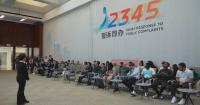 Beijing's citizen service hotline impresses foreign journalists with AI-human integration