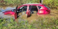 Isaias’ remnants bring flooding, rescues and road closures to western North Carolina: Photos here