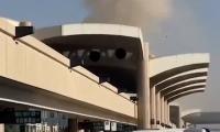 Saudi airport is hit by missile day after Houthi attack killed 13 and injured hundreds - as Trump says he is considering the US joining attack 