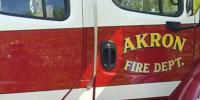 Akron home burns for second time in a week; one person taken to hospital for evaluation