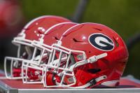 Georgia LB Raylen Wilson shoved in helmet by Alabama fan after game