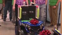 Kansas City high school robotics students modify toy cars for children with mobility challenges