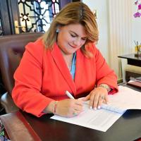 Governor signs measures on agriculture, political advertising and medical cannabis; vetoes driving‑school licensing bill