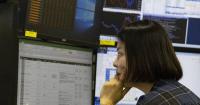 Asian shares mixed on Trump's Russian diesel deal