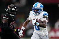 Monday Sports – Lions score 31 unanswered in 45-21 rout of Cardinals