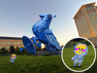 Friendly robot emerges from massive bird-like spaceship in Detroit, wants to “meet new pals”