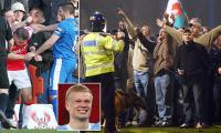 Fans punching players, pitch invasions, vile abuse and stars rushed to safety: These are the top 10 most toxic games I've been to - and where Liverpool v Man City ranks
