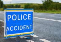 Road shut after collision between van and two cars