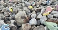 Who’s been painting faces on the rocks down by the river in the New Orleans French Quarter?