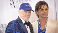 John Stamos Voices Concerns About The Beach Boys’ Mike Love’s “Health Challenges”: “We Don’t Know What the Future Holds”