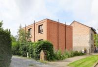 The Interior of This Brick Home in Belgium Takes an Unexpected Turn