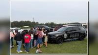 Warsaw police meet with fifth graders during Careers in Motion event