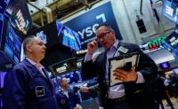 Nasdaq ends lower as oil prices surge ahead of earnings, economic data