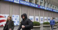 Nasdaq falls as oil prices rally ahead of earnings, economic data