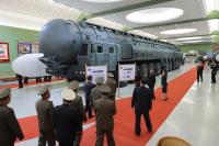 Kim Jong Un opens new weapons museum as North Korea claims missile test success