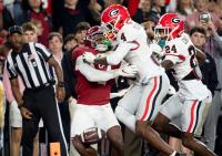 Alabama chides 'unacceptable behavior' of fans who threw objects at Georgia players