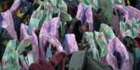 Packing hope: 300 volunteers build 1,000 kits for Michigan foster children