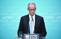 Germany's coalition hit by turmoil as labour minister quits