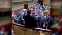 Climate change activist hijacks NSW parliament question time