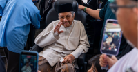 Malaysia's former PM Mahathir returns to public eye in better spirits after wife Siti Hasmah's death