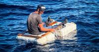 A Cuban man is rescued in a tiny raft off Key Biscayne