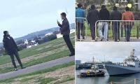 Indian Navy sailors visiting UK on training exercise are mistaken for migrants by anti-immigration protesters in Plymouth