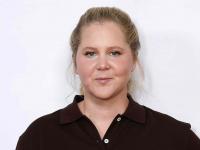 Amy Schumer, 45, goes scuba diving in a lingerie-inspired floral swimsuit