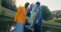 Eric Church Brings NFL Legend Randy Moss To His Private Lake In Search Of A 10-Pound Bass