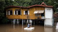 Thailand floods villages to protect capital