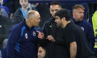 Millwall manager says 'I don't see the point' in stopping football matches for racism and 'killing momentum' - after his team lost while fans chanted amid 'racist chanting' at a South Korean star
