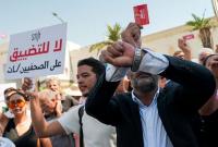 Tunisian journalists fear jail again as freedoms erode
