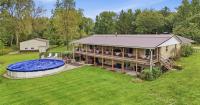 Real estate: $727.7K Springfield home and property for sale has 3 barns, a fruit orchard and a creek