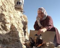 Palestinian Woman Struggles to Rebuild H...