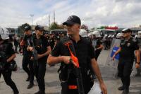 The Turkish police raided a television station that reports critically on Erdogan