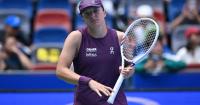 Relentless Swiatek wins all-Polish battle to launch Wuhan campaign